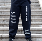 Black Preview Sweatpants by The Heights and The Hills. Features the text "Ladera," "Baldwin," and "View Park-Windsor," in the center of the right pant leg, and the text "The Heights and The Hills" fashioned diagonally in the center of the left pant leg. The lower left pant-leg features the zip codes 90008, 90056, 90043 stacked on top of each other. Only available at TheHeightsAndTheHills.com